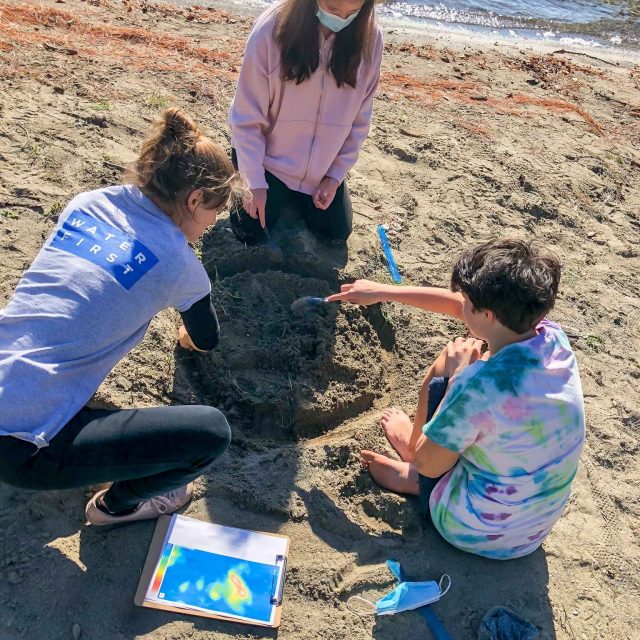 At a small beach on Lake Temagami, students built a topographic model of Bear Island in the sand. A ‘pollution source’ was later added, and a simulated rainstorm demonstrated how point-source pollution negatively affects a watershed.