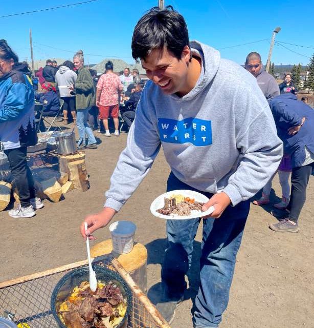 Dillon from our Indigenous Schools Water Program at a local feast, the first gathering since before COVID; Caribou, pemmican, geese, fish, bannock!