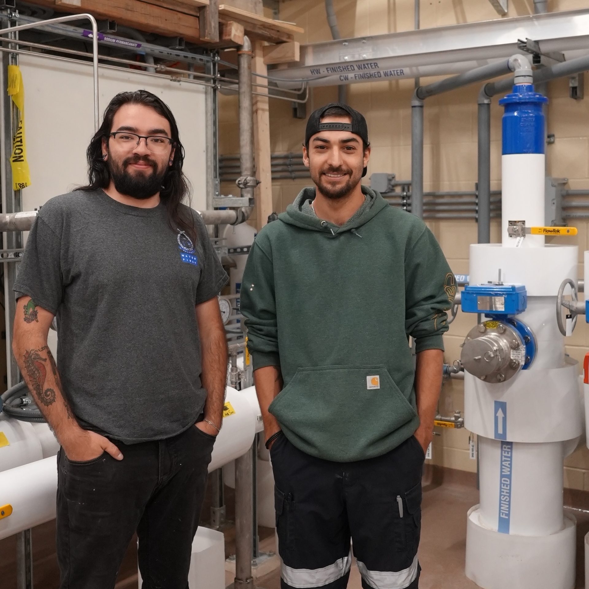 Dyami and John pose in the Shawanaga Water Treatment Plant